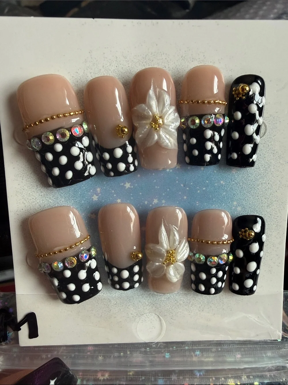 Black Polka Dot Press-On Nails with Nude Base and 3D Flower Accent